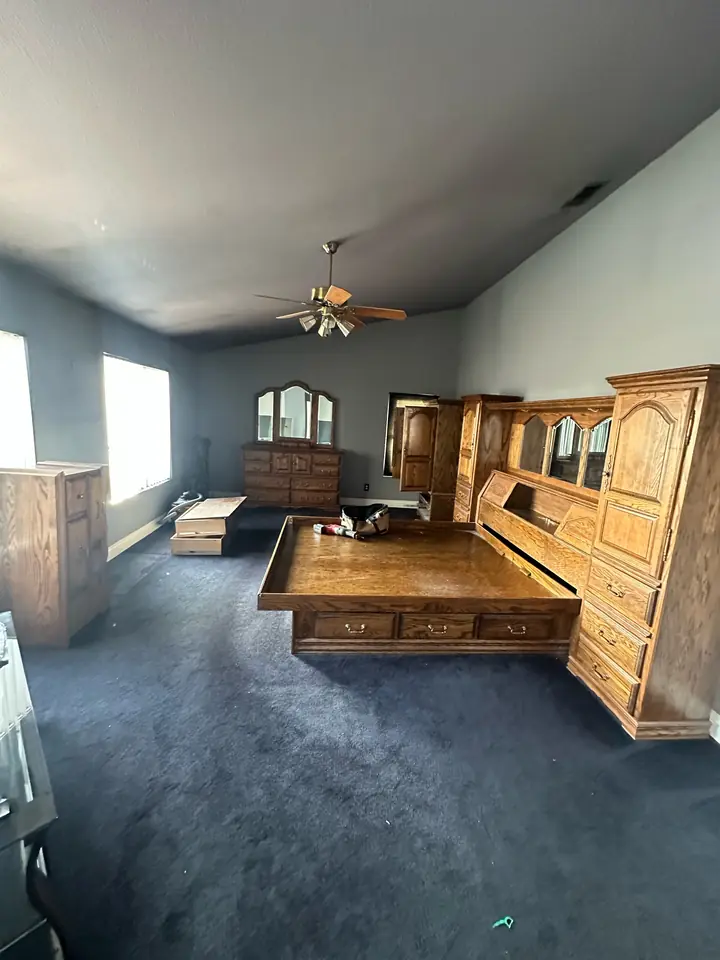 Interior room before large furniture and loose contents were removed